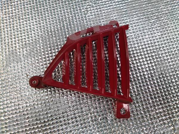 -OCCASION- GRILLE DE FLANC GAUCHE (ROUGE BRILLANT)KYMCO K-PW 50 4T 